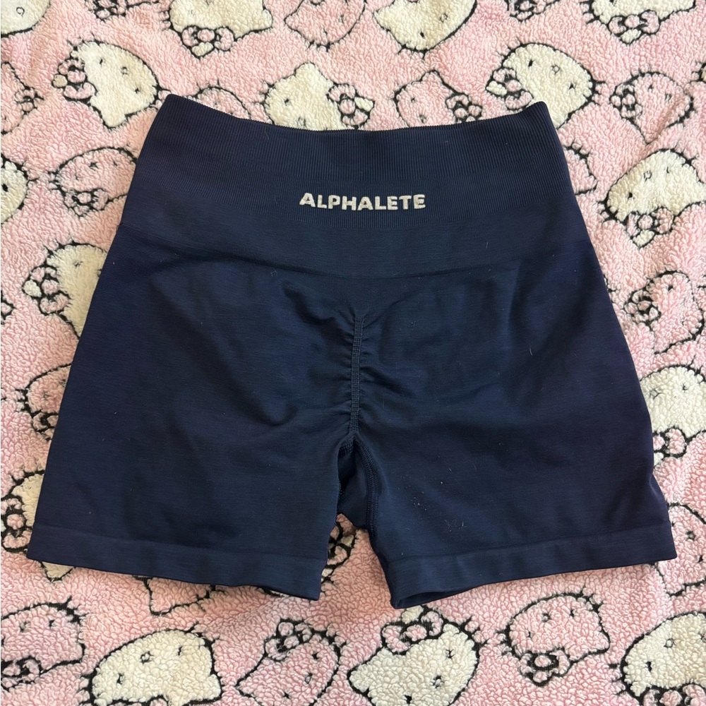 navy blue high waisted Alphalete shorts.